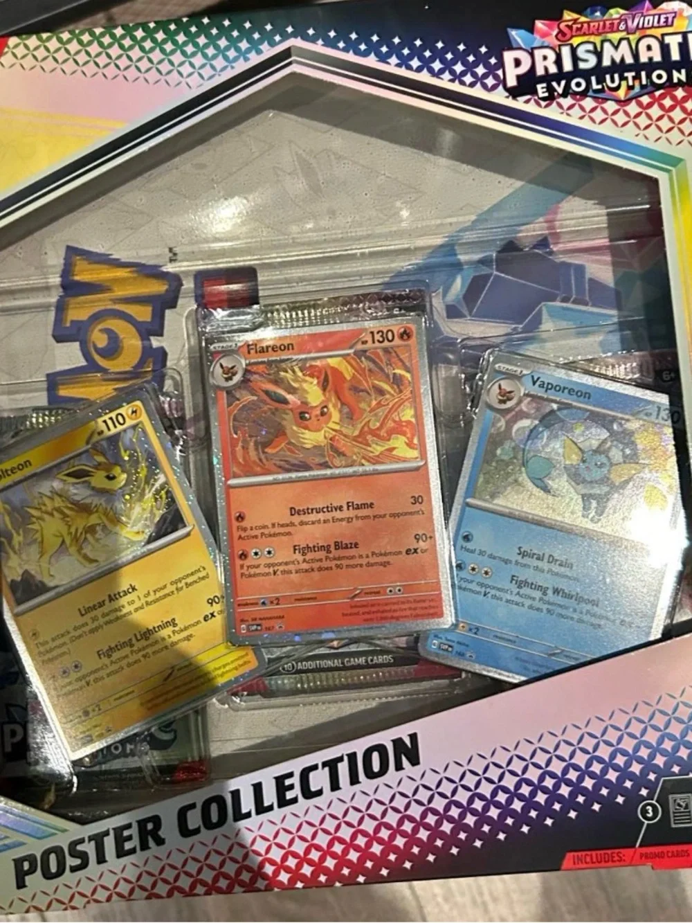 6 Pokemon Prismatic Evolution Poster Collection with Yellow, Orange, Blue Cards